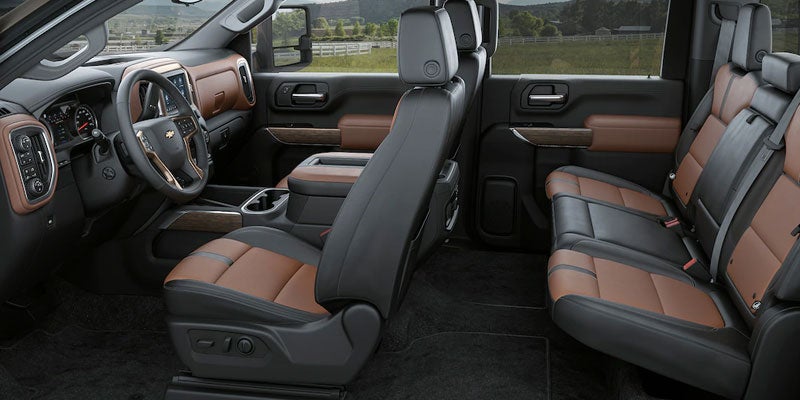 Interior of a Silverado HD with brown and black leather seating